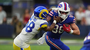 Sep 8, 2022; Inglewood, California, USA; Buffalo Bills tight end Dawson Knox (88) runs against Los Angeles Rams linebacker Justin Hollins (58) in the second quarter at SoFi Stadium