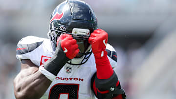 Sep 21, 2025; Jacksonville, Florida, USA; Houston Texans linebacker Azeez Al-Shaair (0) celebrates a play in the second quarter against the Jacksonville Jaguars at EverBank Stadium. Mandatory Credit: Morgan Tencza-Imagn Images