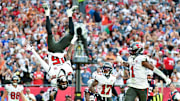 Nov 9, 2025; Tampa, Florida, USA; Tampa Bay Buccaneers wide receiver Tez Johnson (15) flips while celebrating a touchdown during the third quarter against the New England Patriots at Raymond James Stadium. Mandatory Credit: Jonathan Dyer-Imagn Images