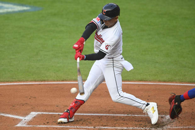 Andres Gimenez singles in the second inning against the Chicago Cubs.