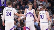 Oct 29, 2025; Salt Lake City, Utah, USA: Utah Jazz forward Lauri Markkanen (23) interacts with center Walker Kessler (24) and guard Svi Mykhailiuk (10) after a basket against the Portland Trail Blazers during the second quarter at Delta Center. Mandatory Credit: Rob Gray-Imagn Images