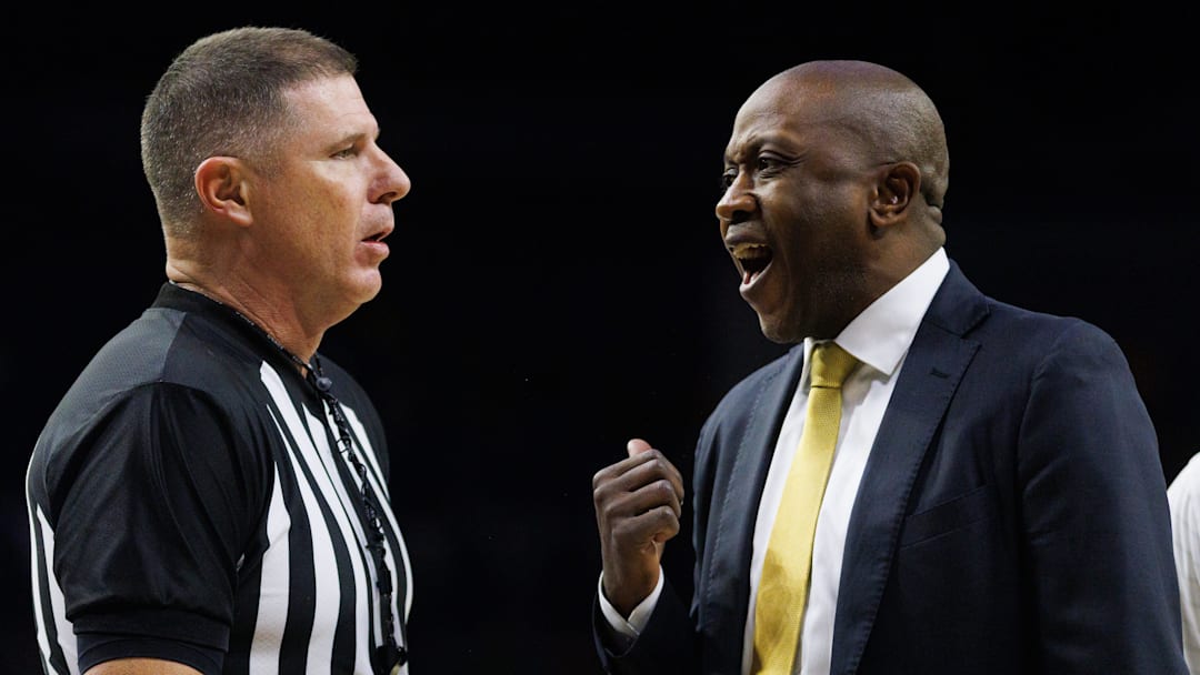 Missouri head coach Dennis Gates, right, speaks with an official during a NCAA men's basketball game against Notre Dame at Purcell Pavilion on Tuesday, Dec. 2, 2025, in South Bend.