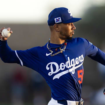 Mar 4, 2025; Phoenix, Arizona, USA; Los Angeles Dodgers shortstop Mookie Betts (50) against the Cincinnati Reds during a spring training game at Camelback Ranch-Glendale. Mandatory Credit: Mark J. Rebilas-Imagn Images