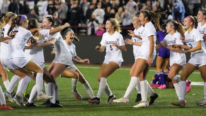 Noblesville Millers celebrate defeating the Bloomington South Panthers on Saturday, Oct. 28, 2023, during the IHSAA girls soccer Class 3A state championship at Michael Carroll Track & Soccer Stadium in Indianapolis. The Noblesville Millers defeated the Bloomington South Panthers, 3-1.