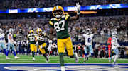 Sep 28, 2025; Arlington, Texas, USA; Green Bay Packers wide receiver Romeo Doubs (87) celebrates in the end zone after he catches a pass for a touchdown during the game between the Dallas Cowboys and the Green Bay Packers at AT&T Stadium. 
