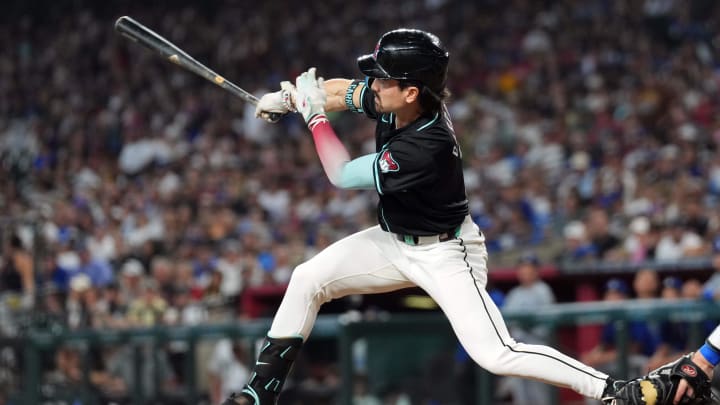 Sep 2, 2024; Phoenix, Arizona, USA; Arizona Diamondbacks outfielder Corbin Carroll (7) bats against the Los Angeles Dodgers during the seventh inning at Chase Field. Mandatory Credit: Joe Camporeale-USA TODAY Sports