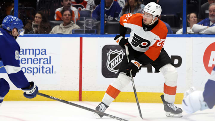 Mar 17, 2025; Tampa, Florida, USA;  Philadelphia Flyers left wing Noah Cates (27) skates with the puck against the Tampa Bay Lightning during the second period at Amalie Arena. 