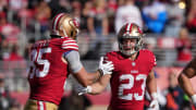 Nov 19, 2023; Santa Clara, California, USA; San Francisco 49ers running back Christian McCaffrey (23) is congratulated by tight end George Kittle (85) after scoring a touchdown against the Tampa Bay Buccaneers during the first quarter at Levi's Stadium.