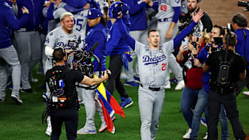 Oct 30, 2024; New York, USA, LAD; Los Angeles Dodgers pitcher Walker Buehler (21) celebrates after the Los Angeles Dodgers beat the New York Yankees in game five to win the 2024 Imagn Images World Series at New York. Mandatory Credit: Wendell Cruz-Imagn Images