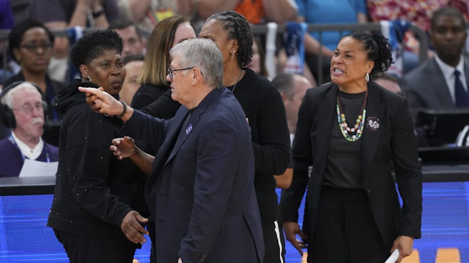 UConn coach Geno Auriemma and South Carolina coach Dawn Staley argue at the end of a semifinal of the Final Four.