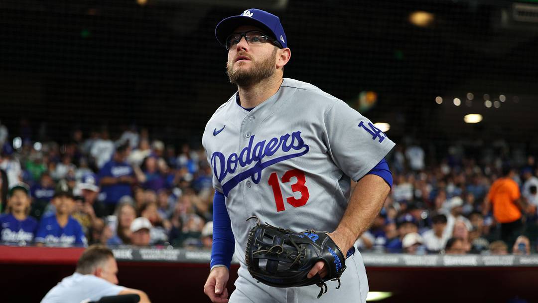 Jun 4, 2026; Phoenix, Arizona, USA; Los Angeles Dodgers third baseman Max Muncy (13) runs out to the field before the game
