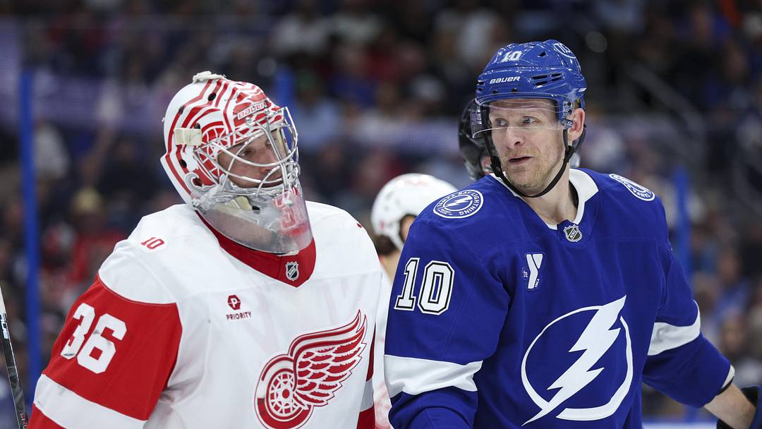 Mar 12, 2026; Tampa, Florida, USA; Tampa Bay Lightning right wing Corey Perry (10) looks to Detroit Red Wings goaltender John Gibson (36) in the first period at Benchmark International Arena. Mandatory Credit: Nathan Ray Seebeck-Imagn Images