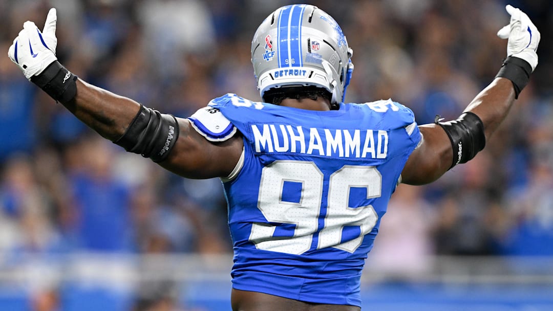 Sep 14, 2025; Detroit, Michigan, USA; Detroit Lions linebacker Al-Quadin Muhammad (96) celebrates after a sack of Chicago Bears quarterback Caleb Williams (not pictured) during the third quarter of the game at Ford Field. Mandatory Credit: Lon Horwedel-Imagn Images