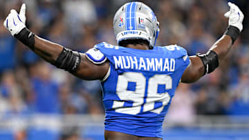 Sep 14, 2025; Detroit, Michigan, USA; Detroit Lions linebacker Al-Quadin Muhammad (96) celebrates after a sack of Chicago Bears quarterback Caleb Williams (not pictured) during the third quarter of the game at Ford Field. Mandatory Credit: Lon Horwedel-Imagn Images