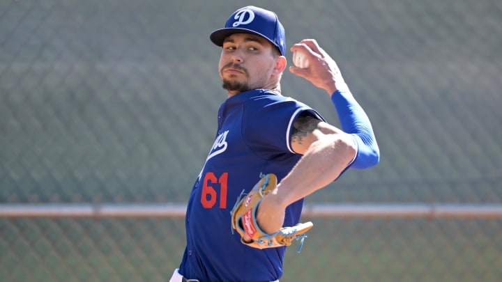 Feb 18, 2024; Glendale, AZ, USA;  Los Angeles Dodgers relief pitcher Ricky Vanasco (61) throws in the bullpen at spring training at Camelback Ranch