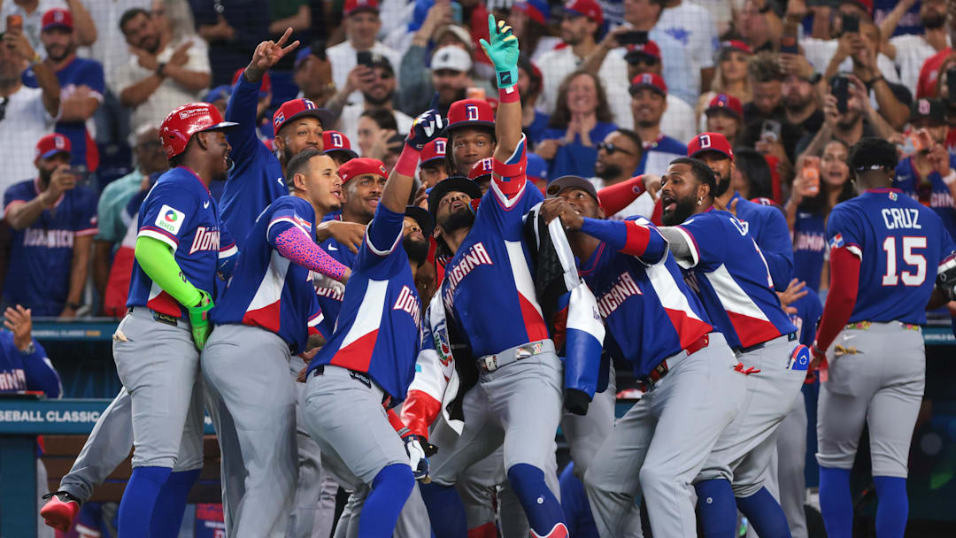 Mar 9, 2026; Miami, FL, United States; Dominican Republic right fielder Fernando Tatis Jr. (23) celebrates with teammates after hitting a grand slam against Israel during the second inning at loanDepot Park. Mandatory Credit: Sam Navarro-Imagn Images Mar 9, 2026; Miami, FL, United States; Dominican Republic right fielder Fernando Tatis Jr. (23) celebrates with teammates after hitting a grand slam against Israel during the second inning at loanDepot Park. Mandatory Credit: Sam Navarro-Imagn Images