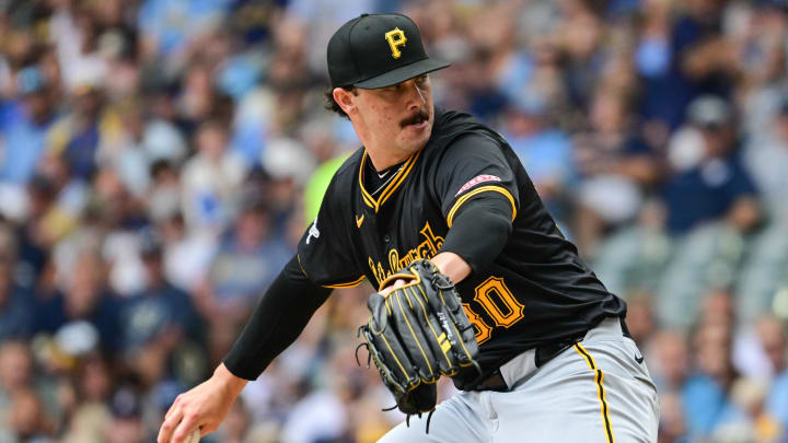 Jul 11, 2024; Milwaukee, Wisconsin, USA; Pittsburgh Pirates starting pitcher Paul Skenes (30) pitches in the first inning against the Milwaukee Brewers at American Family Field. Mandatory Credit: Benny Sieu-USA TODAY Sports