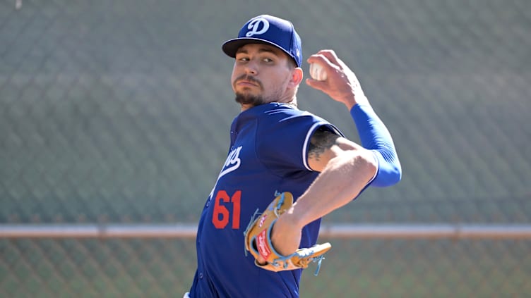 Feb 18, 2024; Glendale, AZ, USA;  Los Angeles Dodgers relief pitcher Ricky Vanasco (61) throws in the bullpen at spring training at Camelback Ranch. Mandatory Credit: Jayne Kamin-Oncea-USA TODAY Sports