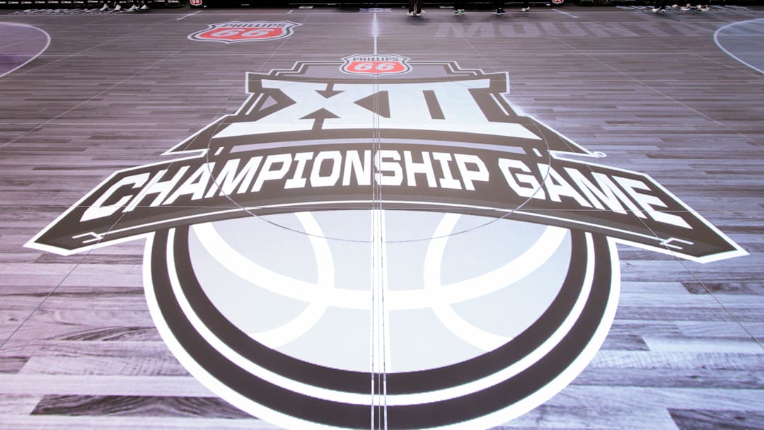 Mar 8, 2026; Kansas City, MO, USA; Championship game logo at center court in the new digital floor prior to the game between the West Virginia Mountaineers and the TCU Horned Frogs at T-Mobile Center. 