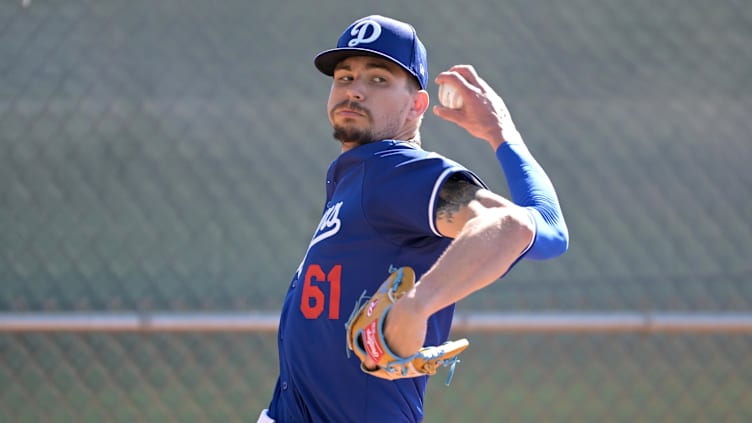 Feb 18, 2024; Glendale, AZ, USA;  Los Angeles Dodgers relief pitcher Ricky Vanasco (61) throws in the bullpen at spring training at Camelback Ranch. Mandatory Credit: Jayne Kamin-Oncea-USA TODAY Sports