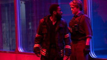 (L-r) JOHN DAVID WASHINGTON and ROBERT PATTINSON and in Warner Bros. Pictures’ action epic "TENET," a Warner Bros. Pictures release. Courtesy of Melinda Sue Gordon, Warner Bros. Pictures 