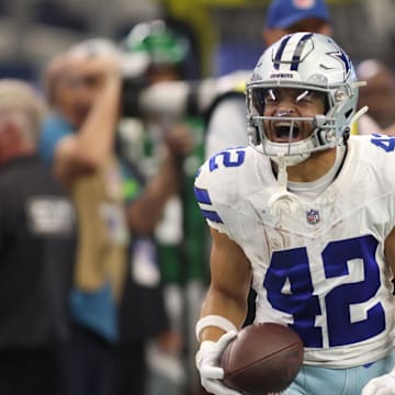 Dallas Cowboys running back Deuce Vaughn reacts after making a first down in the second quarter against the New York Jets.