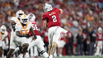 Sep 7, 2024; Charlotte, North Carolina, USA; North Carolina State Wolfpack quarterback Grayson McCall (2) throws the ball under pressure.