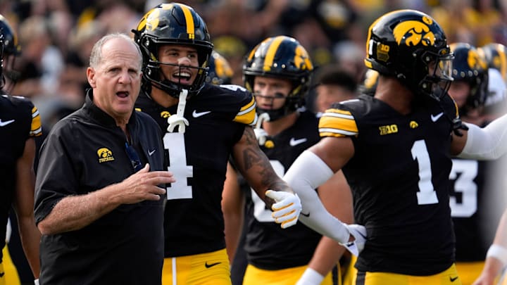 Iowa defensive coordinator Phil Parker leads the defense in warmups Aug. 30, 2025 at Kinnick Stadium in Iowa City, Iowa.