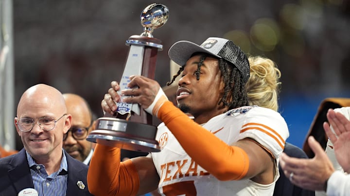 Jan 1, 2025; Atlanta, GA, USA; Texas Longhorns wide receiver Isaiah Bond (7) after winning the Peach Bowl at Mercedes-Benz Stadium. Mandatory Credit: Dale Zanine-Imagn Images Jan 1, 2025; Atlanta, GA, USA; Texas Longhorns wide receiver Isaiah Bond (7) after winning the Peach Bowl at Mercedes-Benz Stadium. Mandatory Credit: Dale Zanine-Imagn Images