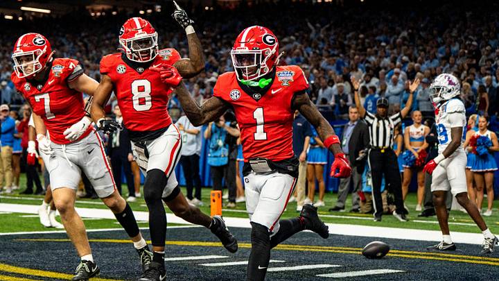 Georgia wide receiver Zachariah Branch (1) celebrates with wide receiver Colbie Young (8) after scoring a touchdown during the Sugar Bowl and College Football Playoff quarterfinals at Caesars Superdome in New Orleans, La., on Thursday, Jan. 1, 2026. Ole Miss defeated Georgia 39-34.