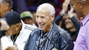 Oct 10, 2023; Seattle, Washington, USA; Former Seattle Supersonics head coach Lenny Wilkens acknowledges the fans after being introduced during a third quarter timeout of a preseason game between the Utah Jazz and LA Clippers at Climate Pledge Arena. Mandatory Credit: Joe Nicholson-Imagn Images