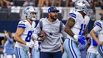 Sep 18, 2022; Arlington, Texas, USA; Dallas Cowboys quarterback Dak Prescott (4) and wide receiver Simi Fehoko (81) and linebacker Micah Parsons (11) run on to the field before the game between the Dallas Cowboys and the Cincinnati Bengals at AT&T Stadium. Mandatory Credit: Jerome Miron-Imagn Images