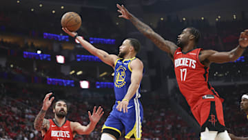Apr 20, 2025; Houston, Texas, USA; Golden State Warriors guard Stephen Curry (30) shoots the ball during the first half against the Houston Rockets at Toyota Center. Mandatory Credit: Troy Taormina-Imagn Images