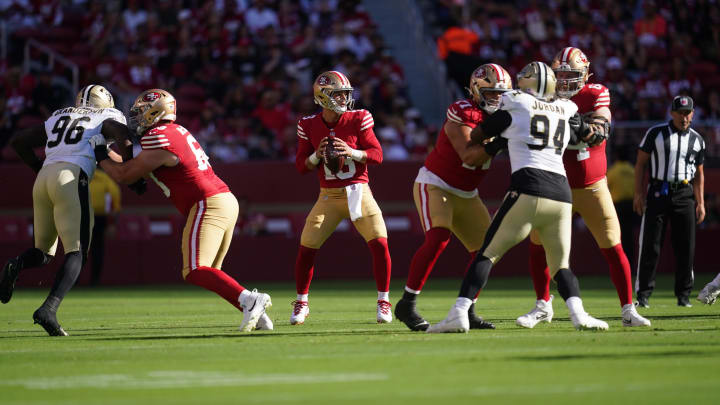 Aug 18, 2024; Santa Clara, California, USA; San Francisco 49ers quarterback Brock Purdy (13) looks to throw a pass against the New Orleans Saints in the first quarter at Levi's Stadium. Mandatory Credit: Cary Edmondson-USA TODAY Sports