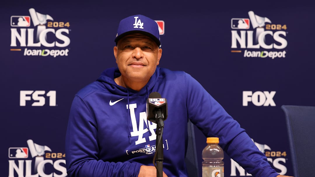 Oct 12, 2024; Los Angeles, CA, USA;  Los Angeles Dodgers manager Dave Roberts (30) speaks with the media at workouts before the start of the NLCS against the New York Mets at Dodgers Stadium. Mandatory Credit: Kiyoshi Mio-Imagn Images