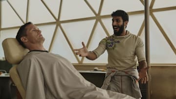 Alexander Skarsgård and Akshay Khanna in "Murderbot," now streaming on Apple TV+