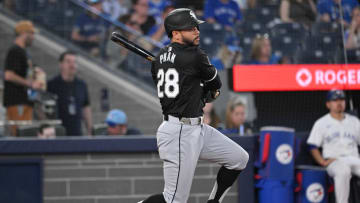 May 21, 2024; Toronto, Ontario, CAN;  Chicago White Sox center fielder Tommy Pham (28) hits a single against the Toronto Blue Jays in the seventh inning at Rogers Centre. Mandatory Credit: Dan Hamilton-USA TODAY Sports