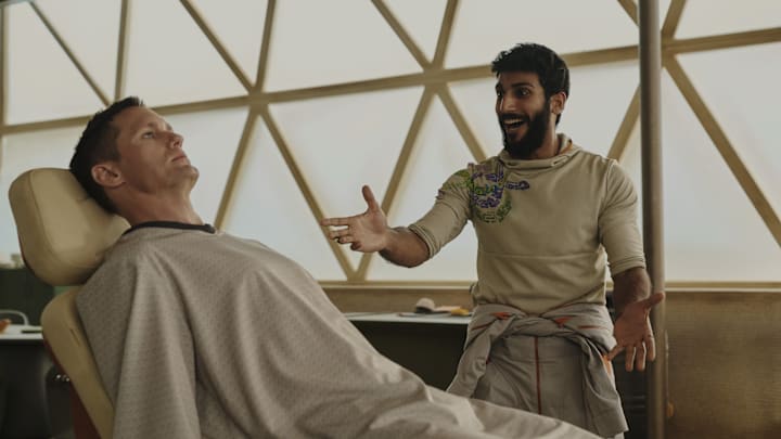 Alexander Skarsgård and Akshay Khanna in "Murderbot," now streaming on Apple TV+