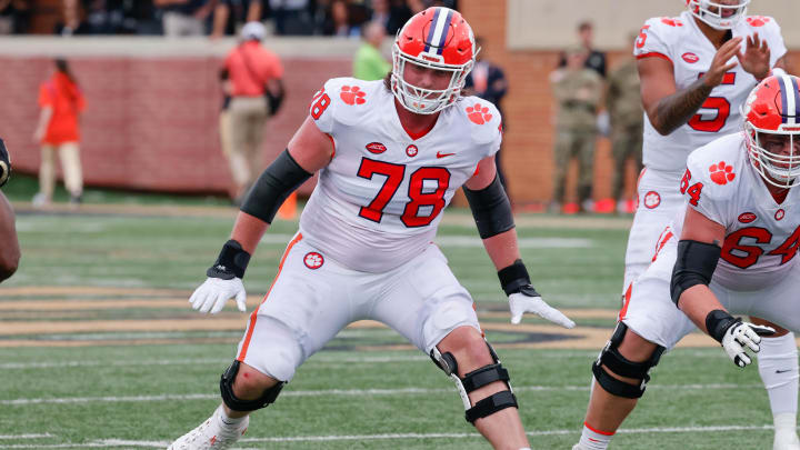 Sep 24, 2022; Winston-Salem, North Carolina, USA;  Clemson Tigers offensive lineman Blake Miller (78) and offensive lineman Walker Parks (64) block during the second quarter against the Wake Forest Demon Deacons at Truist Field. 