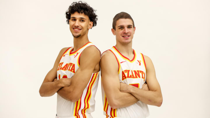 Jun 28, 2024; Atlanta, Georgia, USA; Atlanta Hawks draft picks Zaccharie Risacher (10) and Nikola Djurisic (7) poses for a photo at the Emory Sports Medicine Complex. Mandatory Credit: Brett Davis-USA TODAY Sports