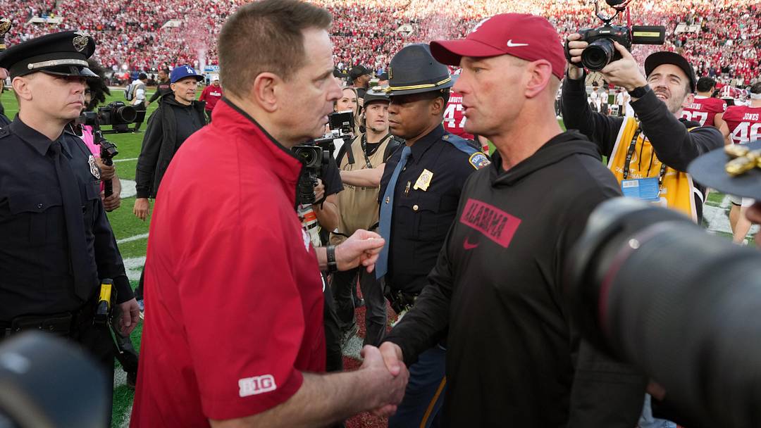 Jan 1, 2026; Pasadena, CA, USA; Indiana Hoosiers head coach Curt Cignetti (left) shakes hands with Alabama Crimson Tide head coach Kalen Deboer after the 2026 Rose Bowl and quarterfinal game of the College Football Playoff at Rose Bowl Stadium. Mandatory Credit: Kirby Lee-Imagn Images