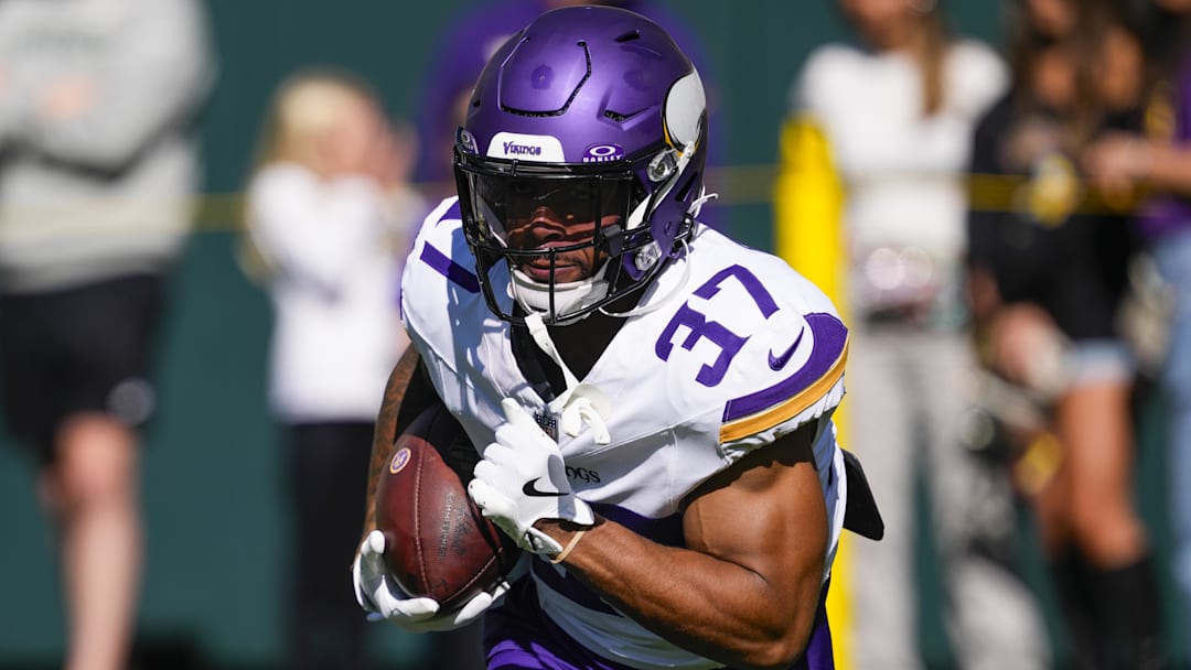 Sep 29, 2024; Green Bay, Wisconsin, USA;  Minnesota Vikings running back Myles Gaskin (37) during warmups prior to the game against the Green Bay Packers at Lambeau Field.