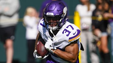 Sep 29, 2024; Green Bay, Wisconsin, USA;  Minnesota Vikings running back Myles Gaskin (37) during warmups prior to the game against the Green Bay Packers at Lambeau Field.