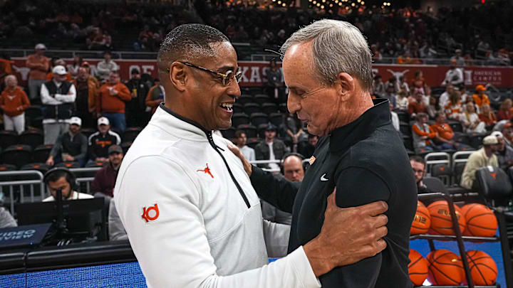 Texas Longhorns head coach Rodney Terry meets Tennessee head coach Rick Barnes ahead of the game at the Moody Center on Saturday, Jan. 11, 2025.