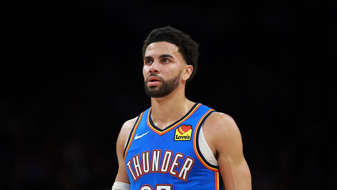 Jan 4, 2026; Phoenix, Arizona, USA; Oklahoma City Thunder guard Ajay Mitchell (25). Mandatory Credit: Mark J. Rebilas-Imagn Images