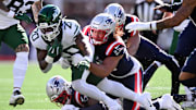 Oct 27, 2024; Foxborough, Massachusetts, USA; New England Patriots wide receiver Kendrick Bourne (84) tackles New York Jets running back Breece Hall (20) during the first half at Gillette Stadium. Mandatory Credit: Brian Fluharty-Imagn Images