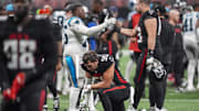 Jan 5, 2025; Atlanta, Georgia, USA; Atlanta Falcons linebacker Kaden Elliss (55) reacts on the field after the Falcons were defeated by the Carolina Panthers in overtime at Mercedes-Benz Stadium. Mandatory Credit: Dale Zanine-Imagn Images