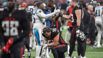 Jan 5, 2025; Atlanta, Georgia, USA; Atlanta Falcons linebacker Kaden Elliss (55) reacts on the field after the Falcons were defeated by the Carolina Panthers in overtime at Mercedes-Benz Stadium. Mandatory Credit: Dale Zanine-Imagn Images