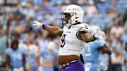 Sep 21, 2024; Chapel Hill, North Carolina, USA; James Madison Dukes defensive lineman Amar Thomas (8) reacts in the second quarter at Kenan Memorial Stadium. Mandatory Credit: Bob Donnan-Imagn Images
