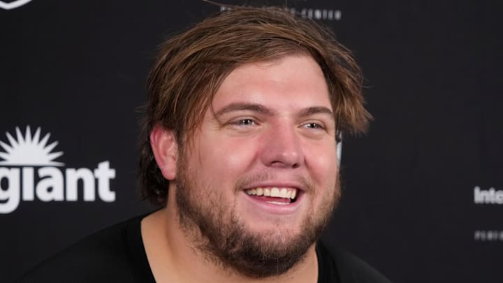 Jul 24, 2025; Henderson, NV, USA; Las Vegas Raiders lineman Jackson Powers-Johnson (58) during training camp press conference at the Intermountain Healthcare Performance Center. Mandatory Credit: Kirby Lee-Imagn Images